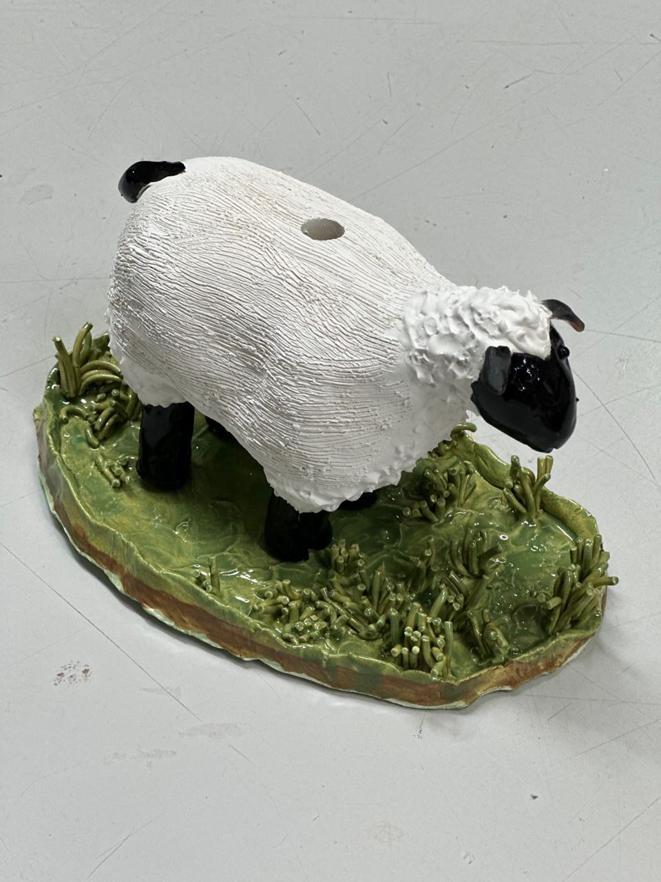 Ceramic Chia Pet sheep in pasture